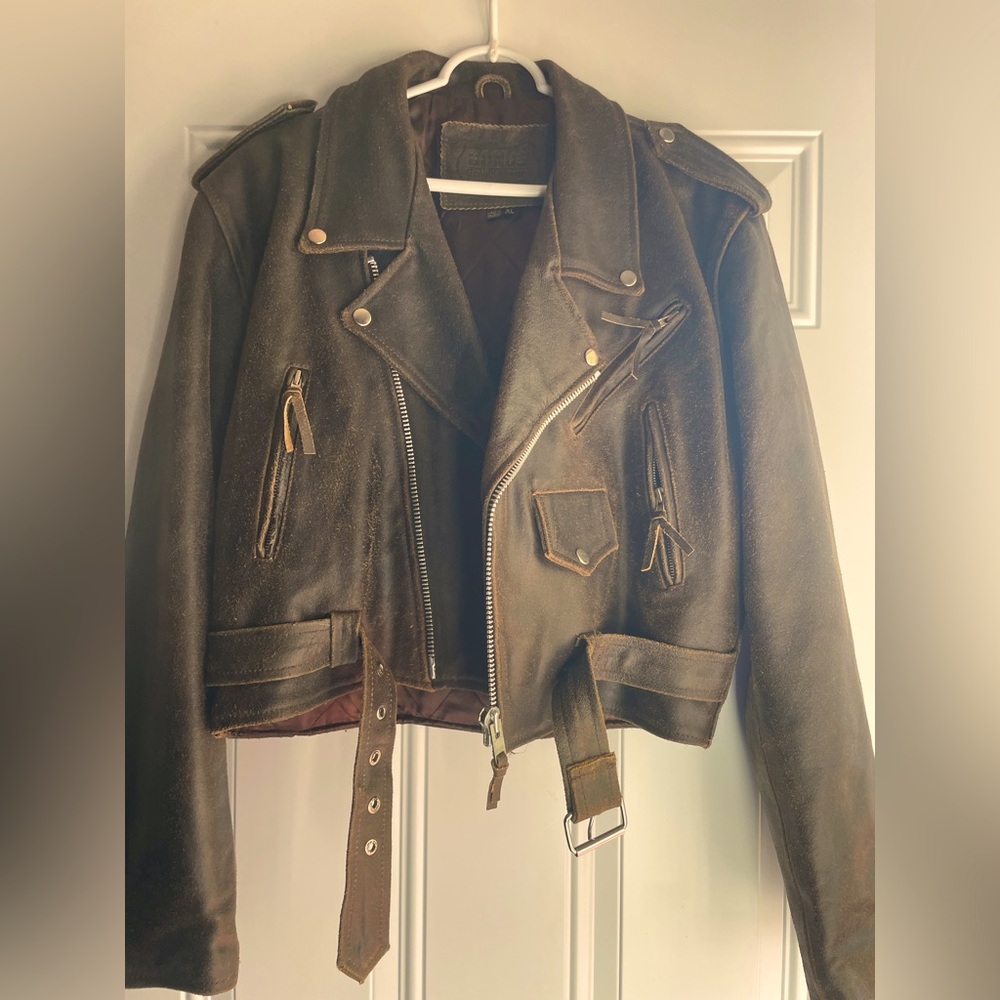 Unisex, distressed, brown leather jacket. Minimal wear.